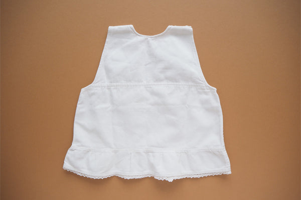 White cotton with a lace trim - 18m