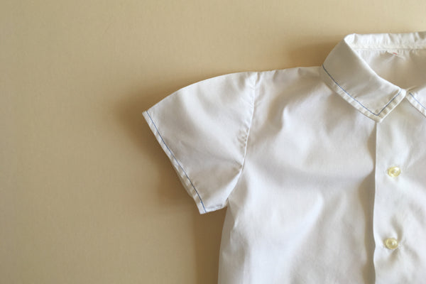 White shirt with blue trim - 2y