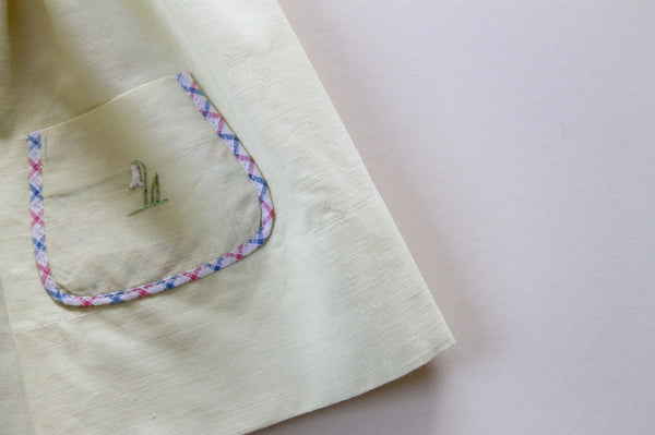 hand-knitted vintage baby dress light pink pocket details made in France