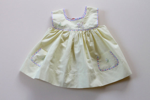 hand-knitted vintage baby dress light yellow front view made in France