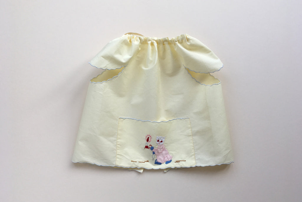 Yellow bib with embroidery - 50% off