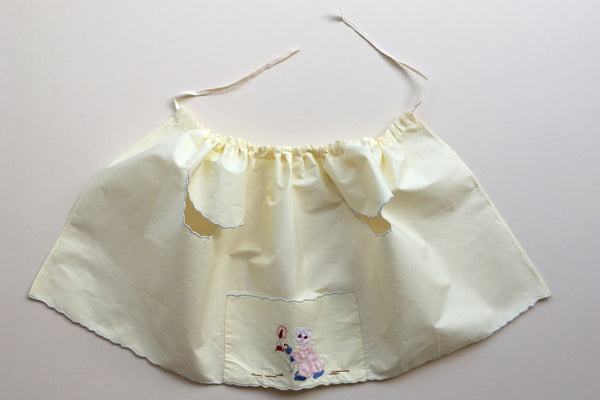 Yellow bib with embroidery - 50% off
