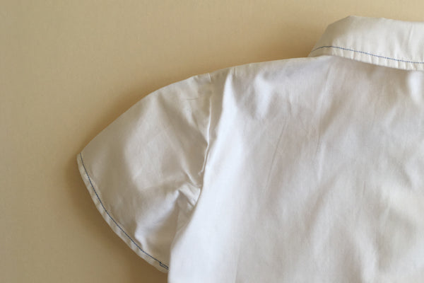 White shirt with blue trim - 2y
